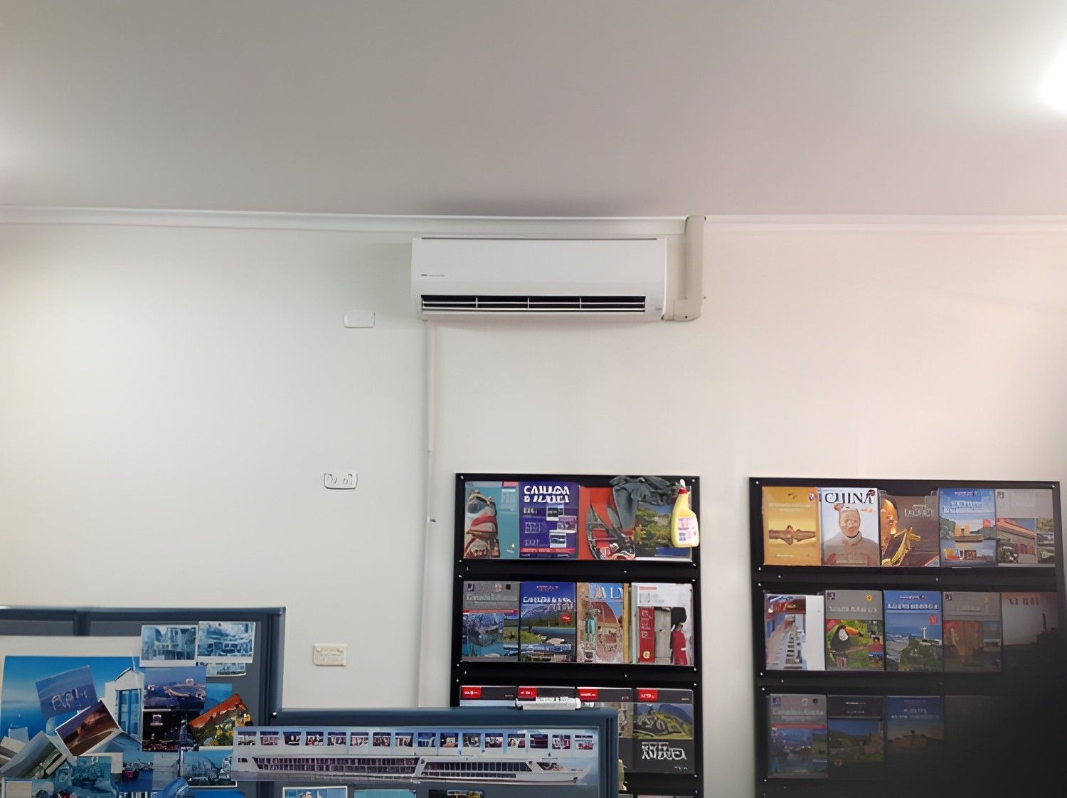A White Walled Room with An Ac Unit — Allchin Airconditioning & Refrigeration Electrical in Caloundra, QLD