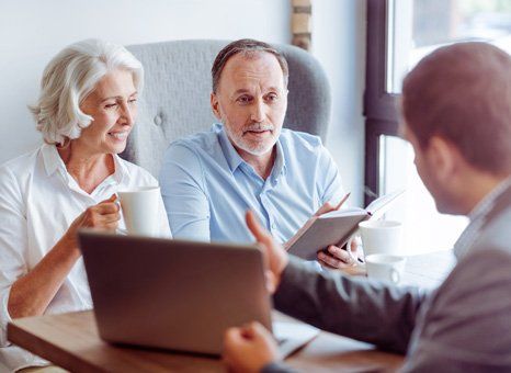 People meeting with a health insurance agency near Pontiac, MI