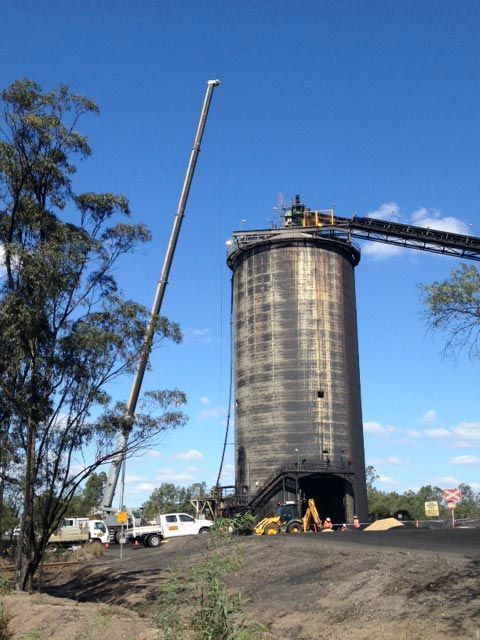 An Aerial View Of A Small Island In The Middle Of A Large Body Of Water — S & W Crane Hire In Collinsville, QLD