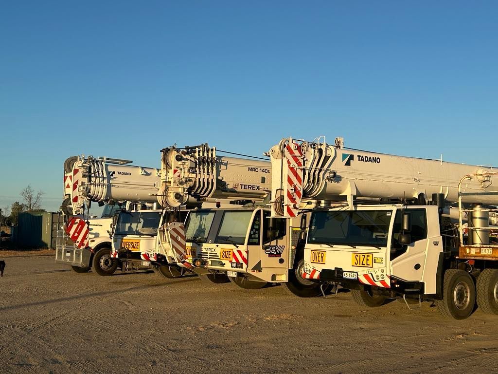 A View Of A Large Body Of Water Surrounded By Trees — S & W Crane Hire In Collinsville, QLD