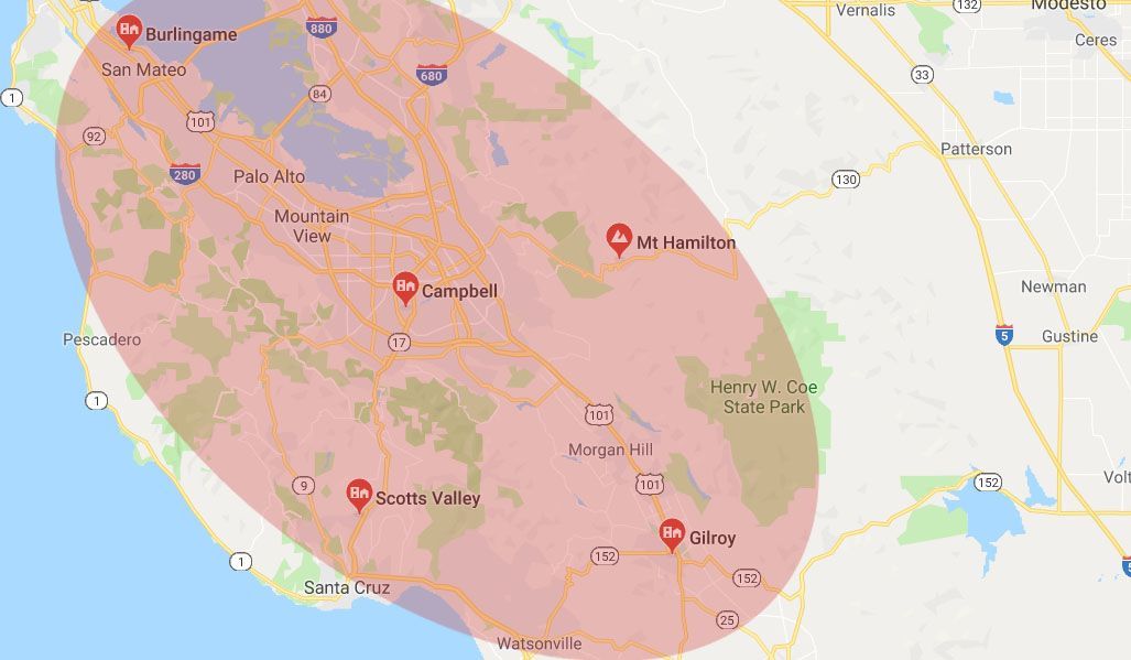 Google map screenshot with red location pins and a large pink highlighted area over a coastal region
