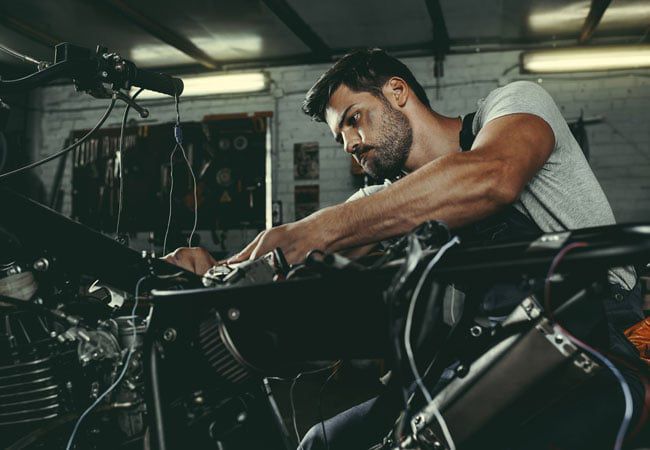 mechanic working on an engine mechanic working on an engine