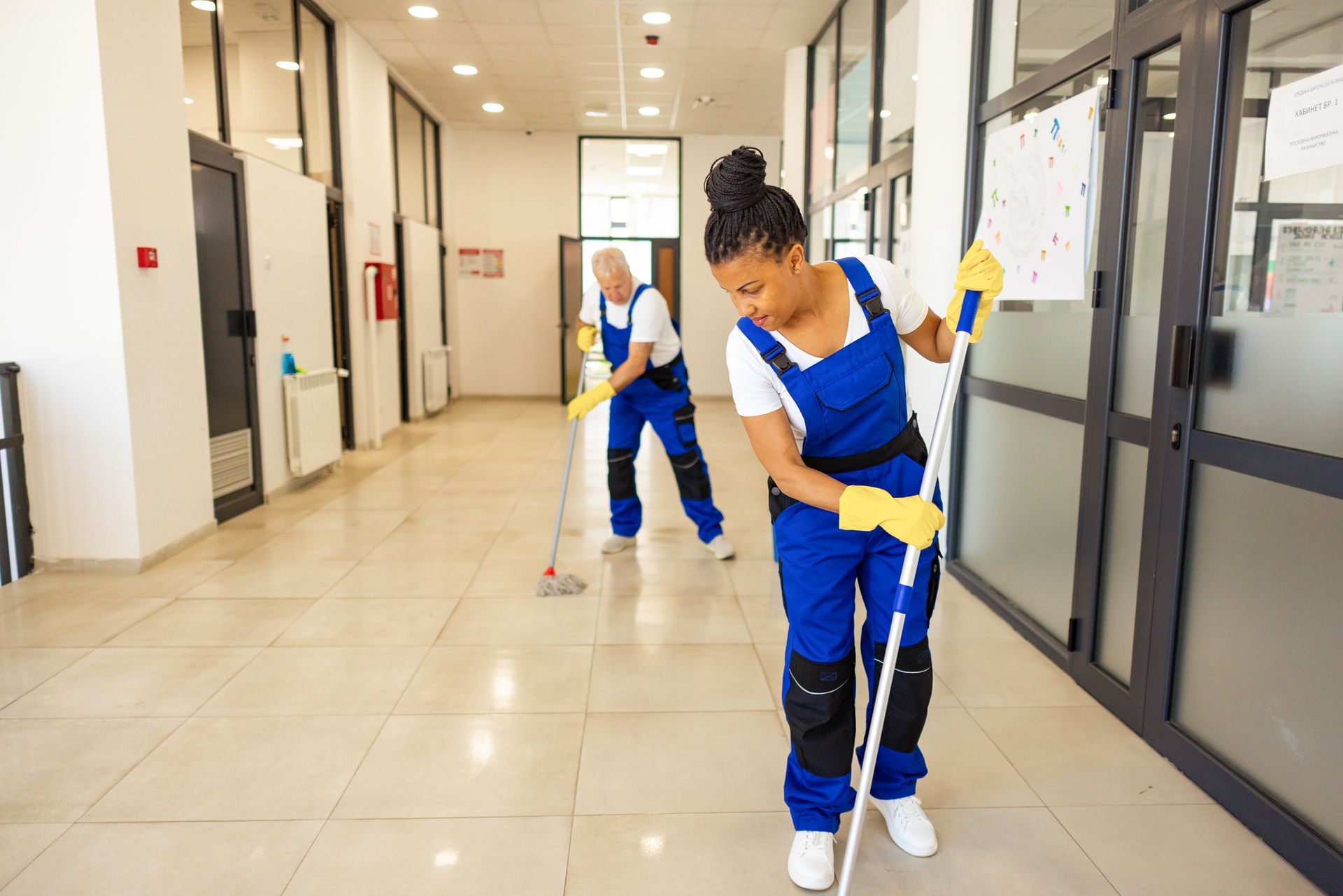 Janitors providing commercial cleaning service for businesses in Omaha NE Janitors providing commercial cleaning service for businesses in Omaha NE