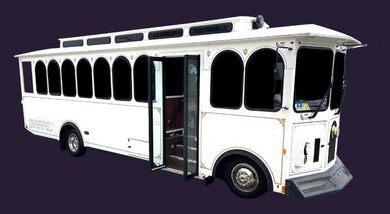 A white trolley bus with the doors open on a purple background.