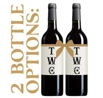 Two dark wine bottles with blank white labels side by side on a white background