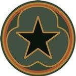 Circular emblem with a black star on a dark green background, outlined in gold and orange