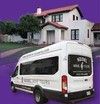 White shuttle van parked in front of a house, with a purple background.