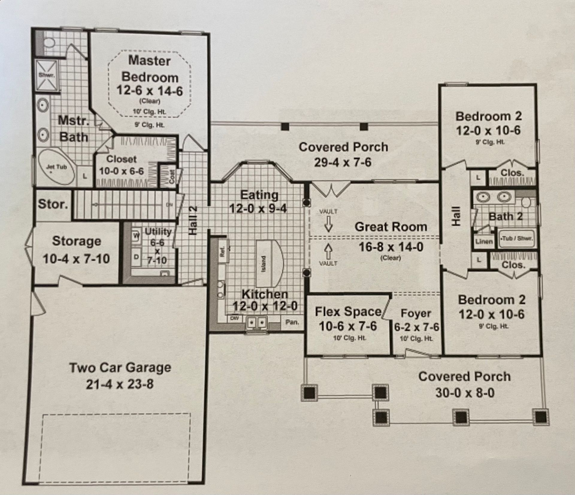 Floor plan of a house with two car garage, covered porches, and rooms labeled master bedroom, kitchen, and great room.