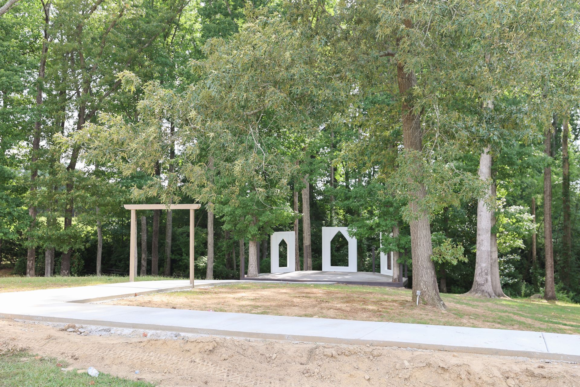 A park with trees and a path going through it