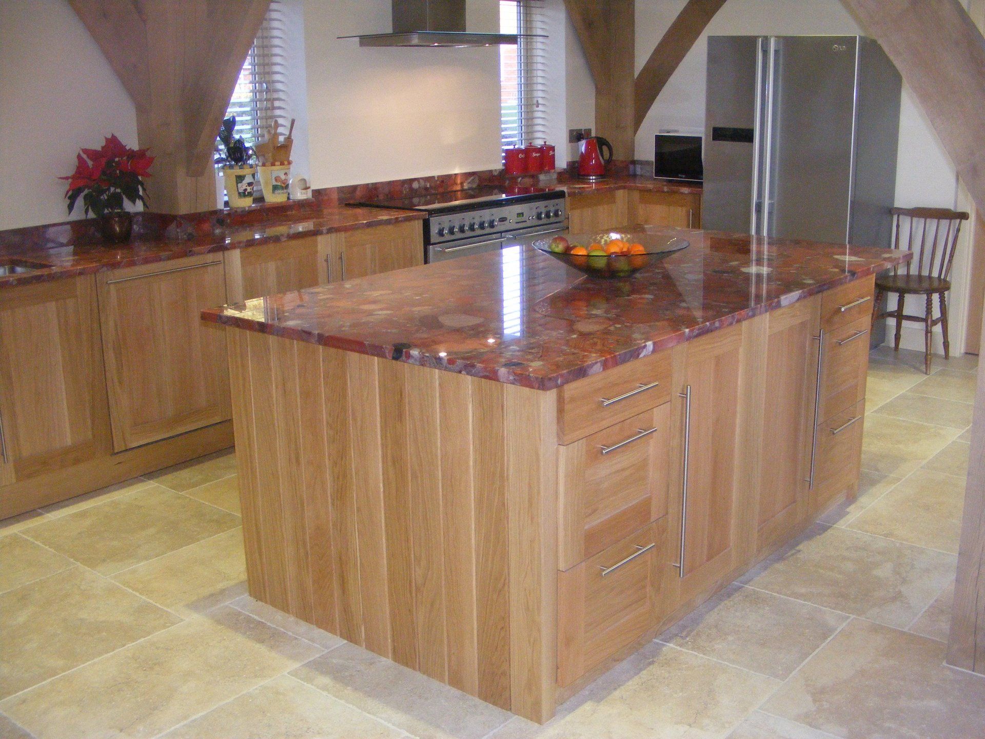 bespoke kitchen
oak worktops
wine rack
painted kitchen
stone worktops
display wall cabinet