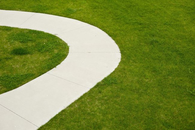 walkway beside the grass