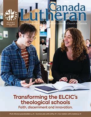 Two people smiling at a table with books, Canada Lutheran magazine cover about theological schools