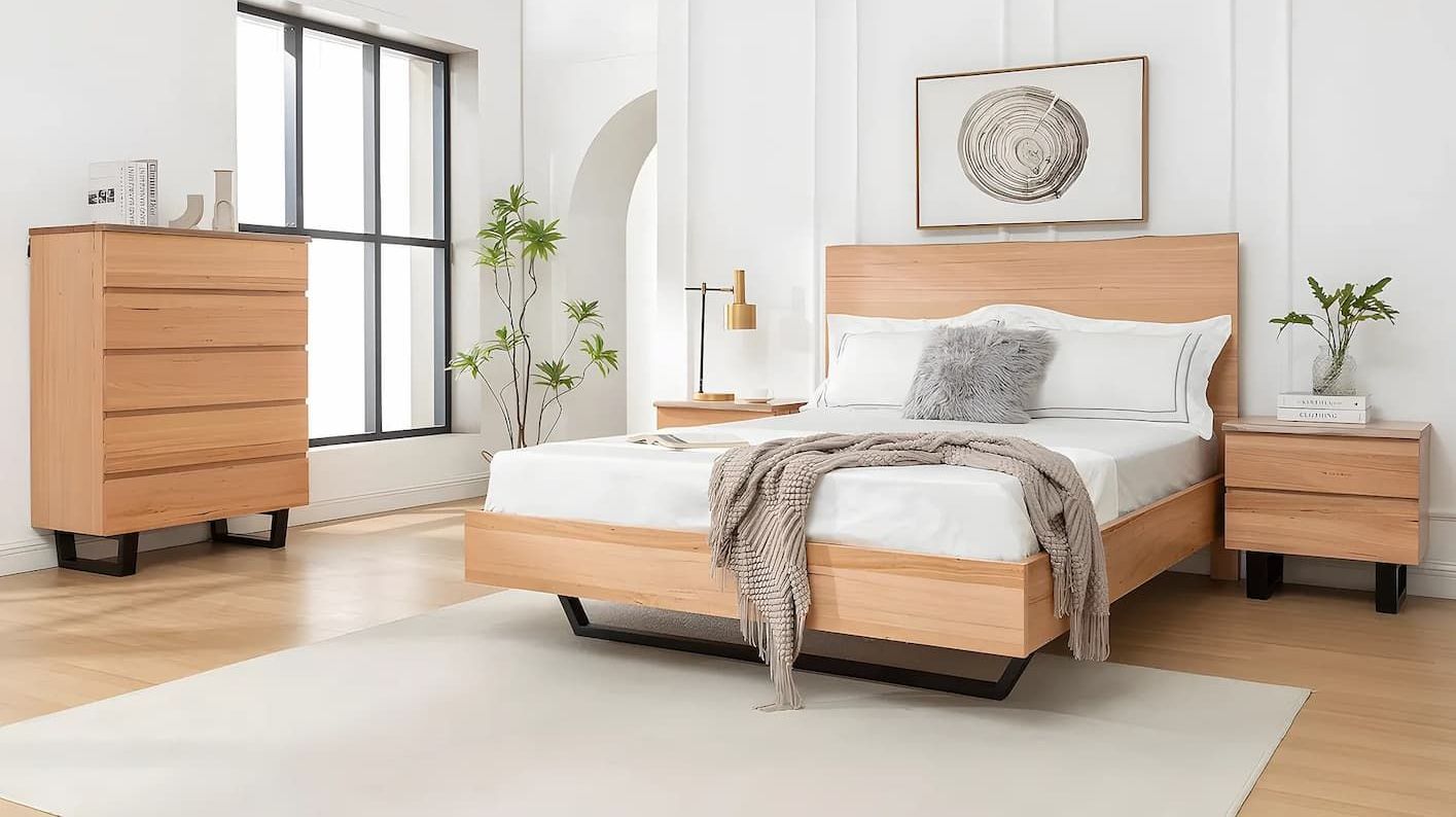 A Bedroom With a Bed, Dresser and Nightstand — Bryants Beds and Mattresses In Lismore, NSW