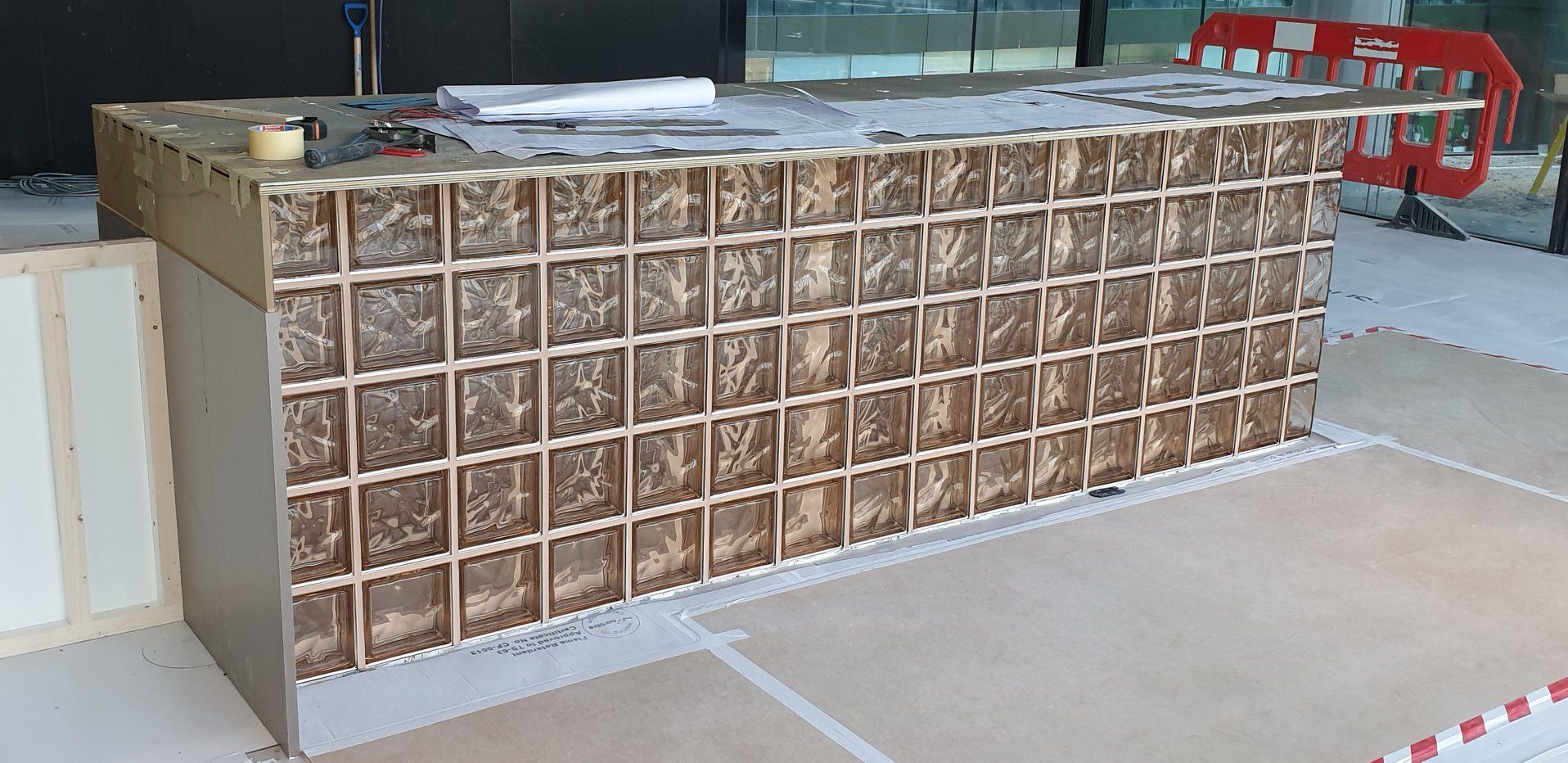 Work station built with tinted glass blocks