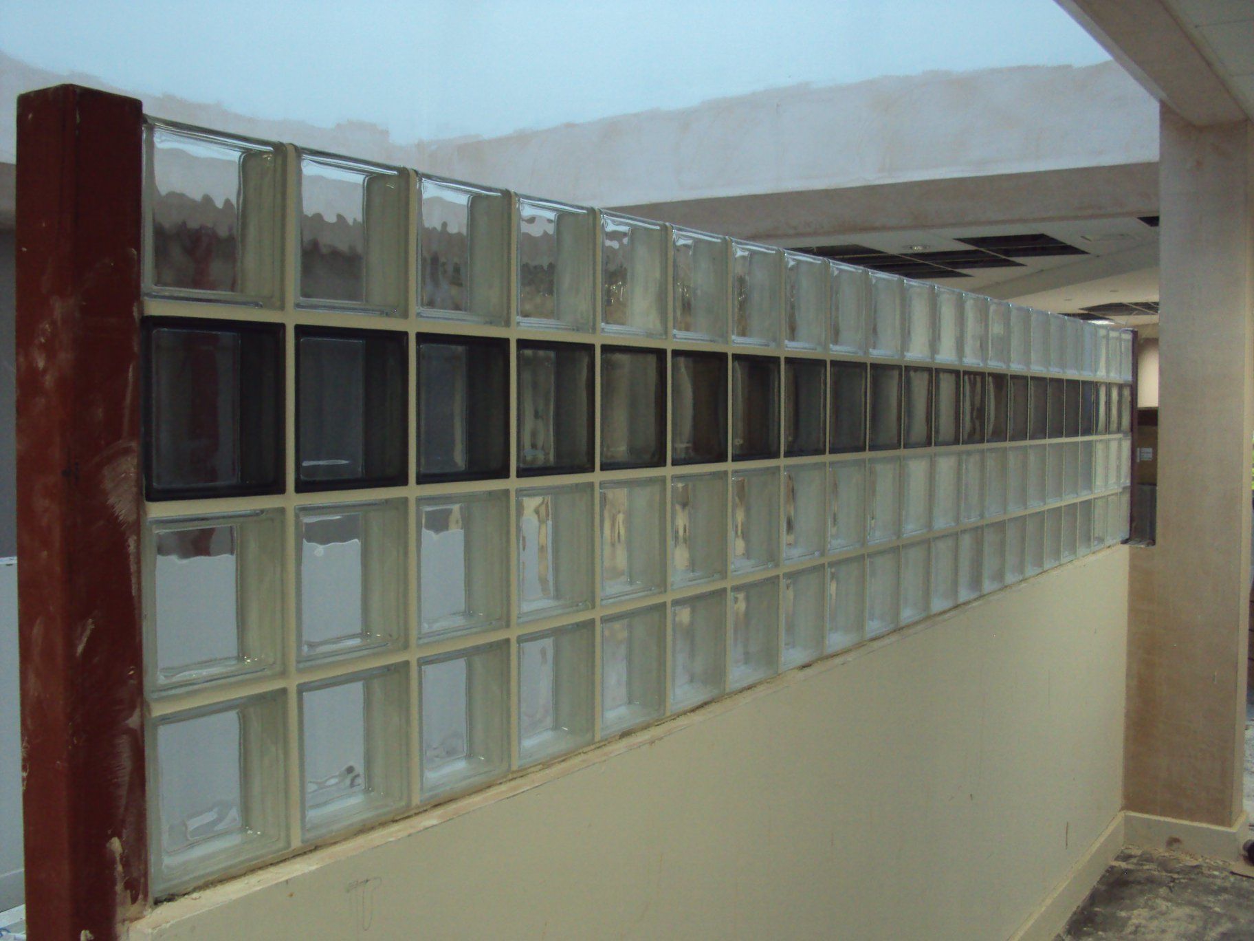Long view of glass block partitions in an office space
