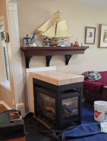 Finished gas fireplace insert with tiled hearth