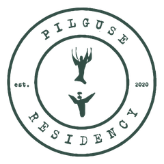 Dark green circular logo with