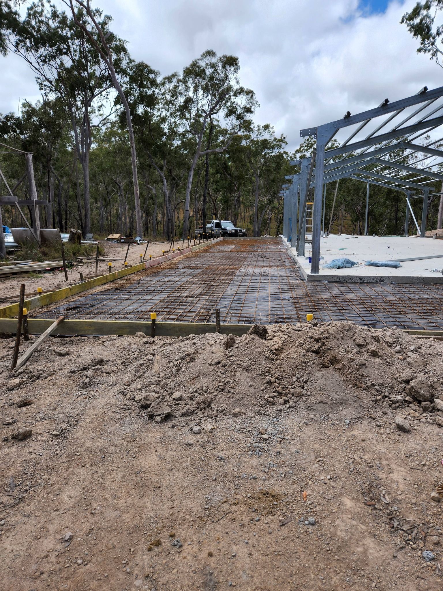 Construction Site With Steel Framework, Concrete Slab — Sun Co Concrete And Construction in Dimbulah, QLD