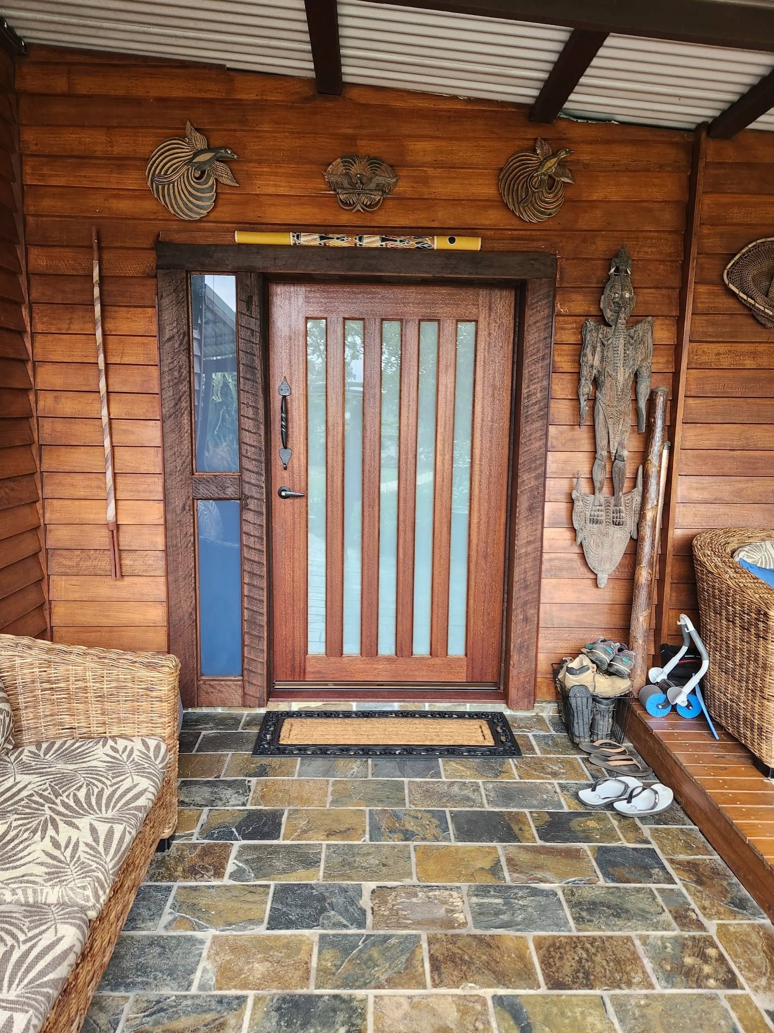 Rustic Wooden Front Door with Vertical Glass Panels — Sun Co Concrete And Construction in Dimbulah, QLD