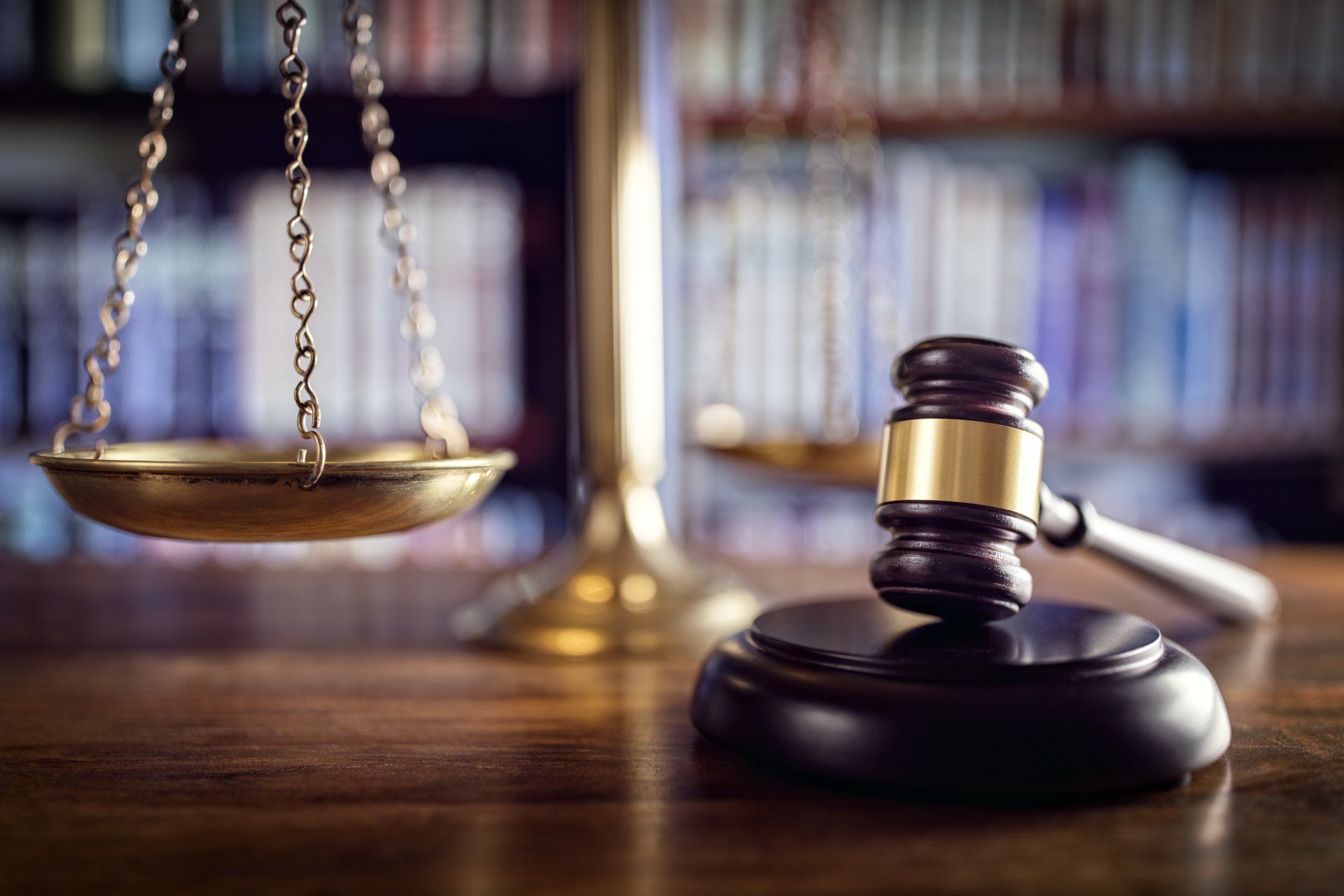 gavel, justice scales, and law books