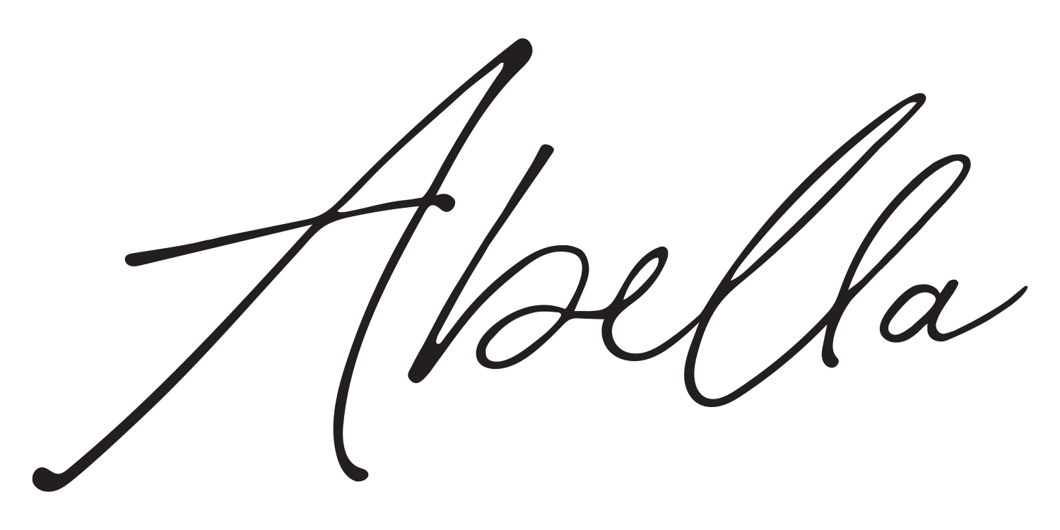 Stylized black handwritten signature reading “Abella” on a white background
