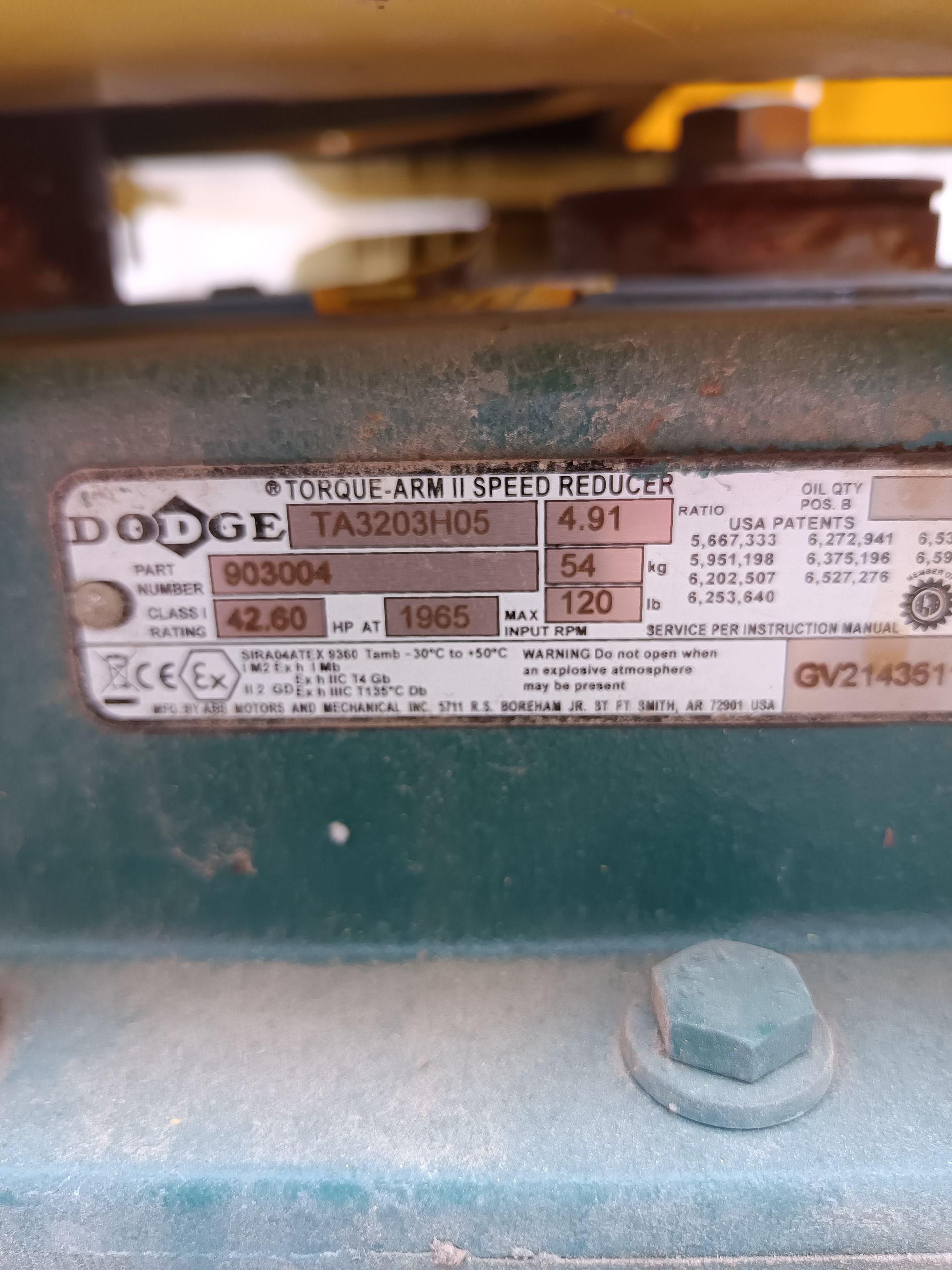 A close up of a dodge motor with a label on it.
