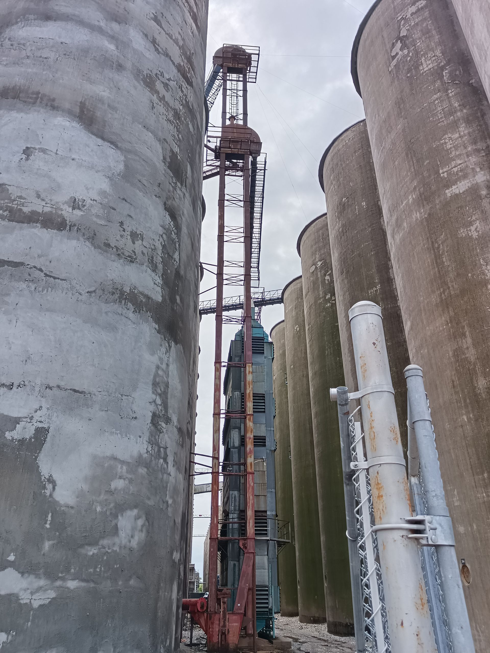 A row of silos are lined up next to each other