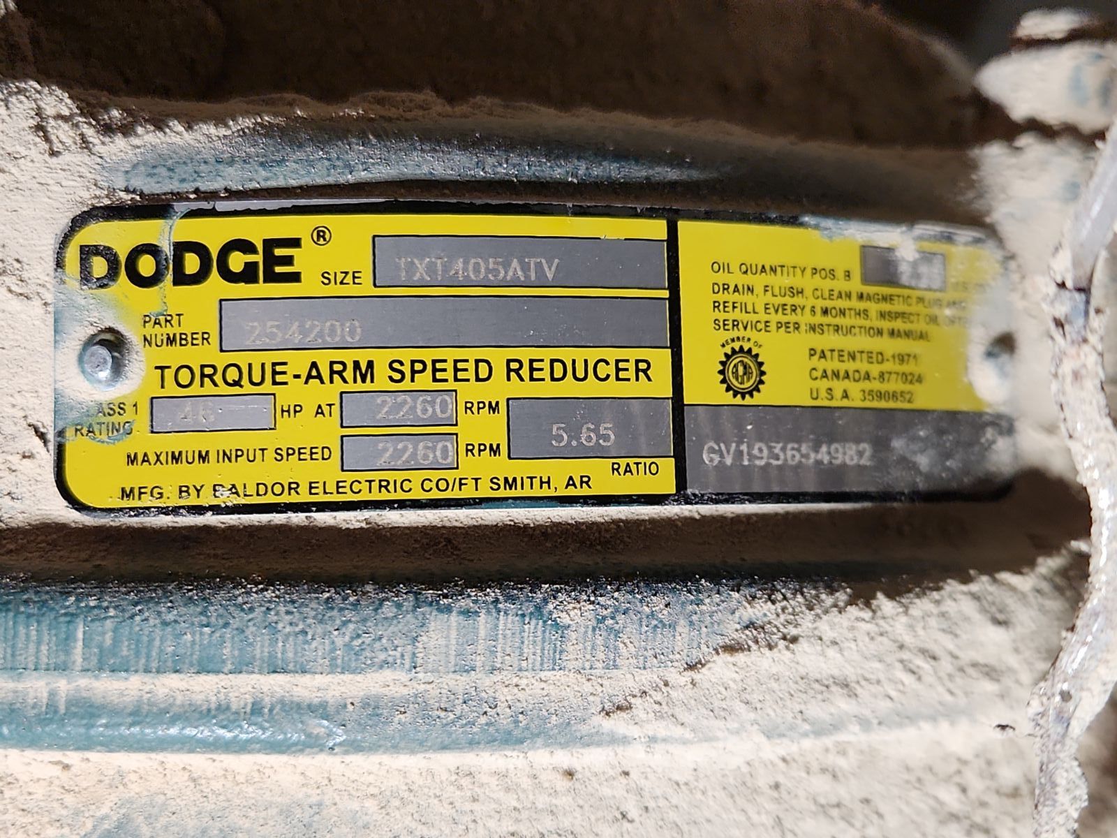 A close up of a dodge torque arm speed reducer
