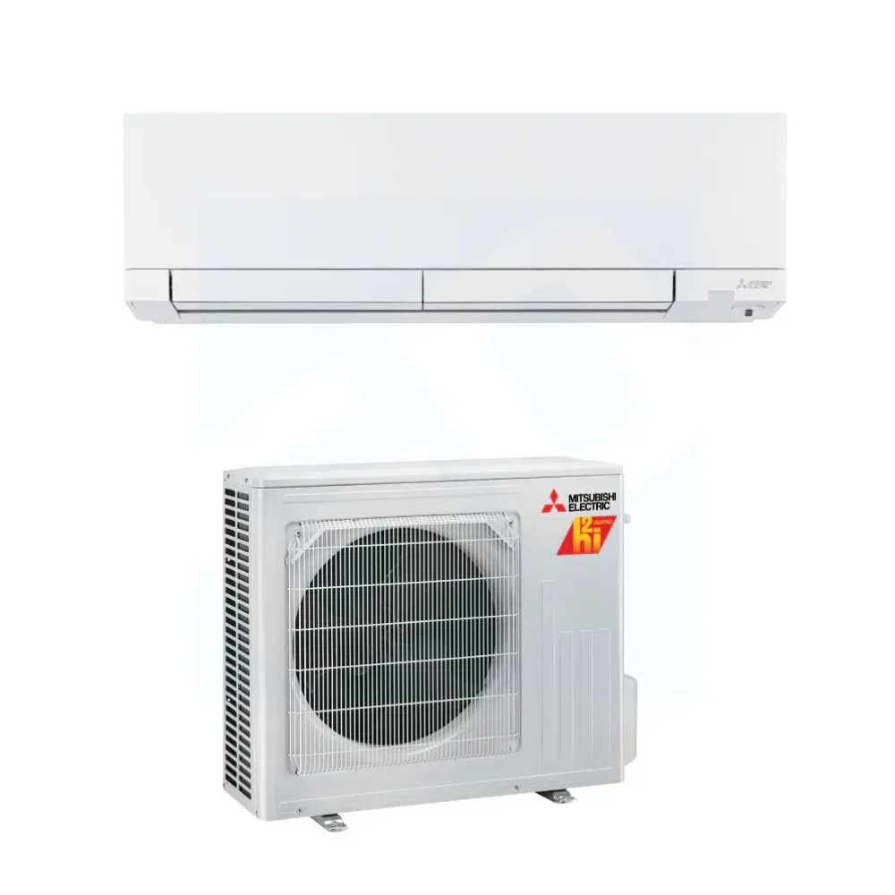 A white indoor wall-mounted air conditioning unit positioned above its matching white outdoor compressor unit.
