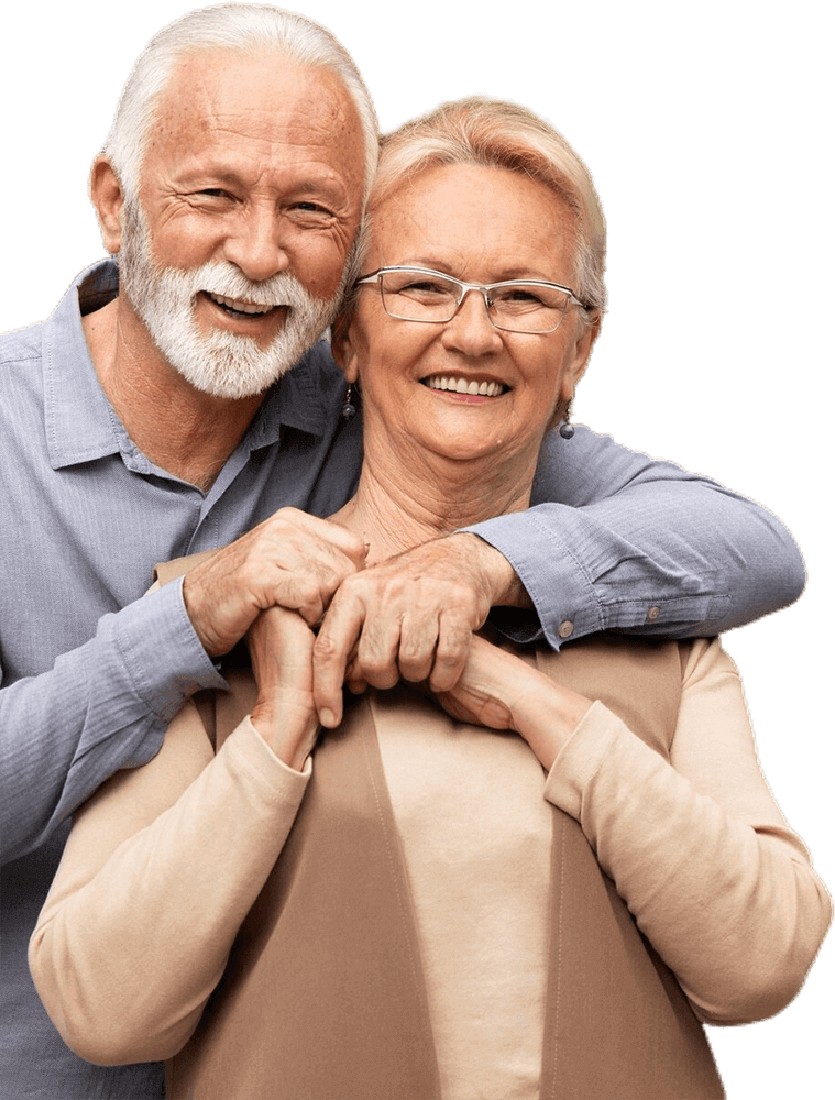 A man and a woman are hugging each other and smiling.