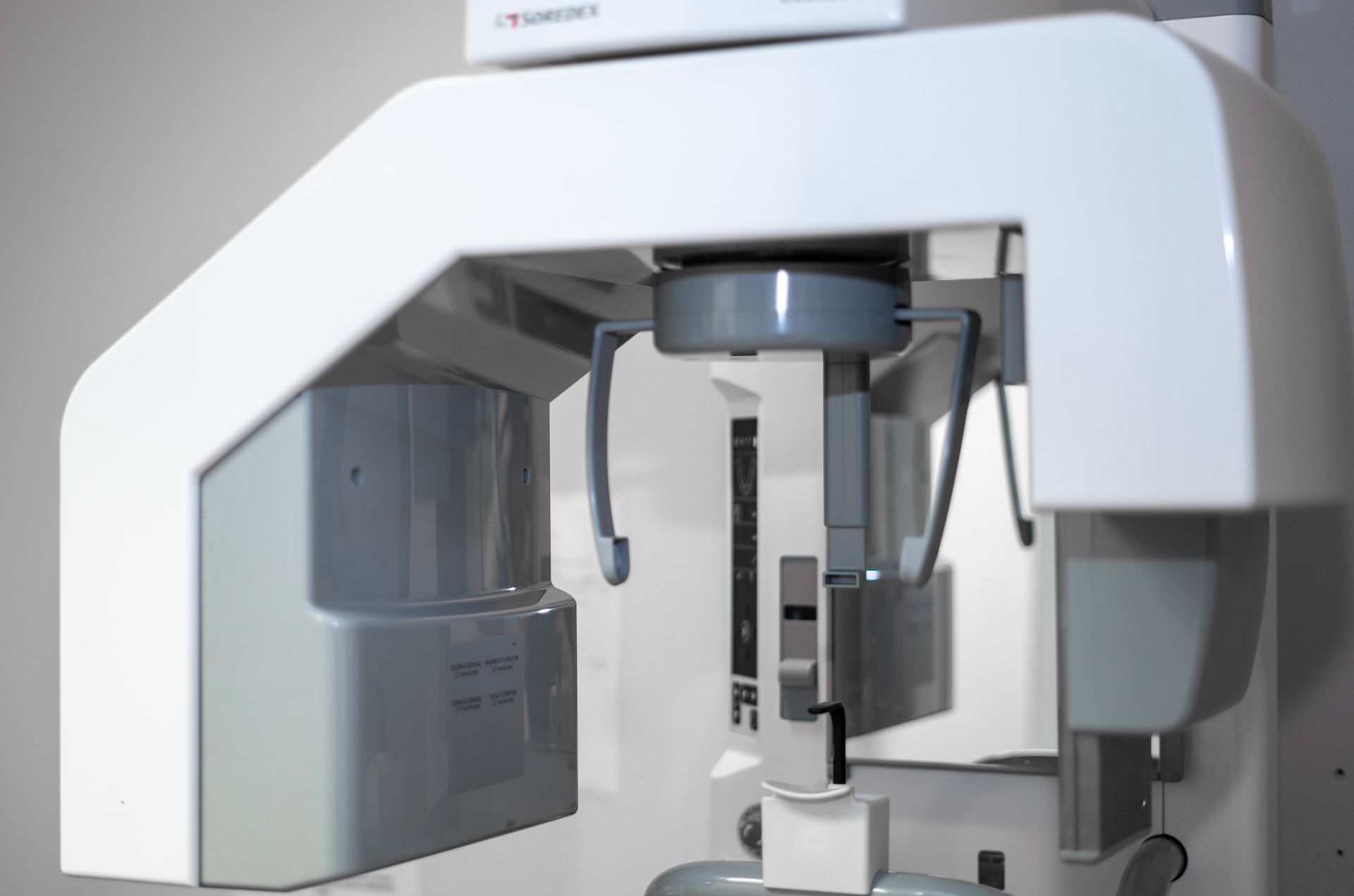 A dental x-ray machine is sitting on a table