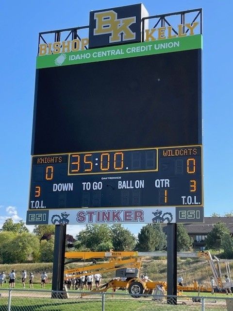 Football scoreboard displaying Bishop Kelly vs. Wildcats game, 35:00 on the clock, both teams at 0 points.