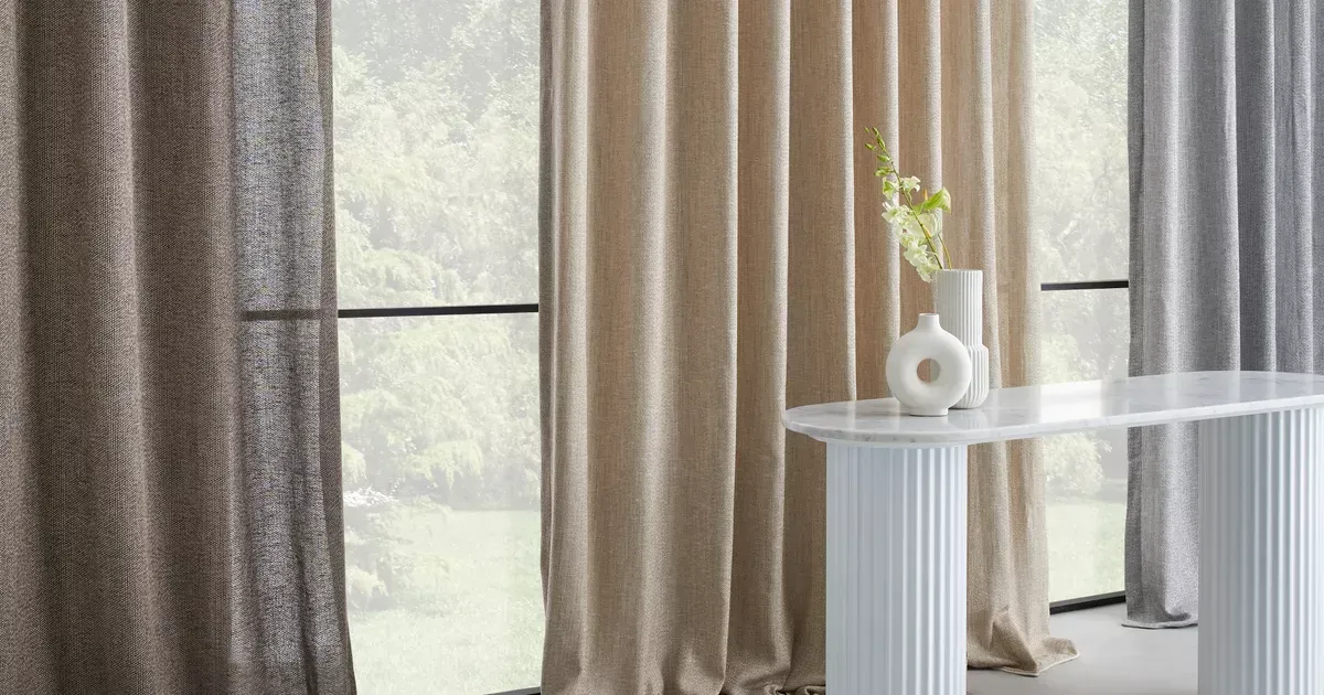 A Close Up Of A Pair Of Curtains Hanging From The Ceiling — Gaeta's Upholstery Blinds & Awnings in Casino, NSW