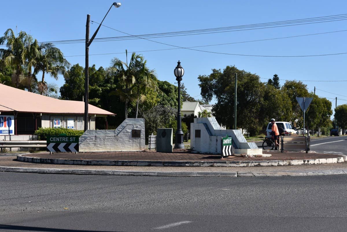 A Street Corner With A Sign That Says ' Queensland ' On It — Gaeta's Upholstery Blinds & Awnings in Casino, NSW