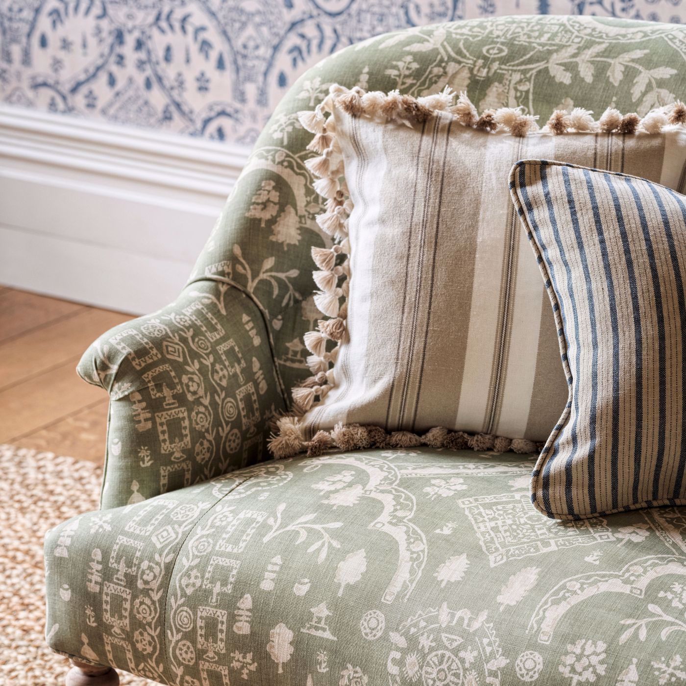 A Person Is Fixing A Chair With Their Hands — Gaeta's Upholstery Blinds & Awnings in Grafton, NSW