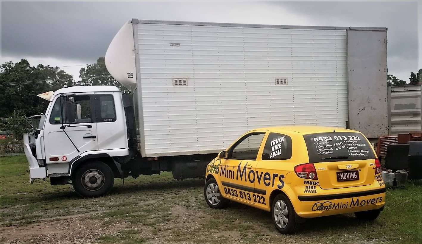 A Yellow Car and a White Truck — Cairns Mini Movers In Mount Sheridan, QLD