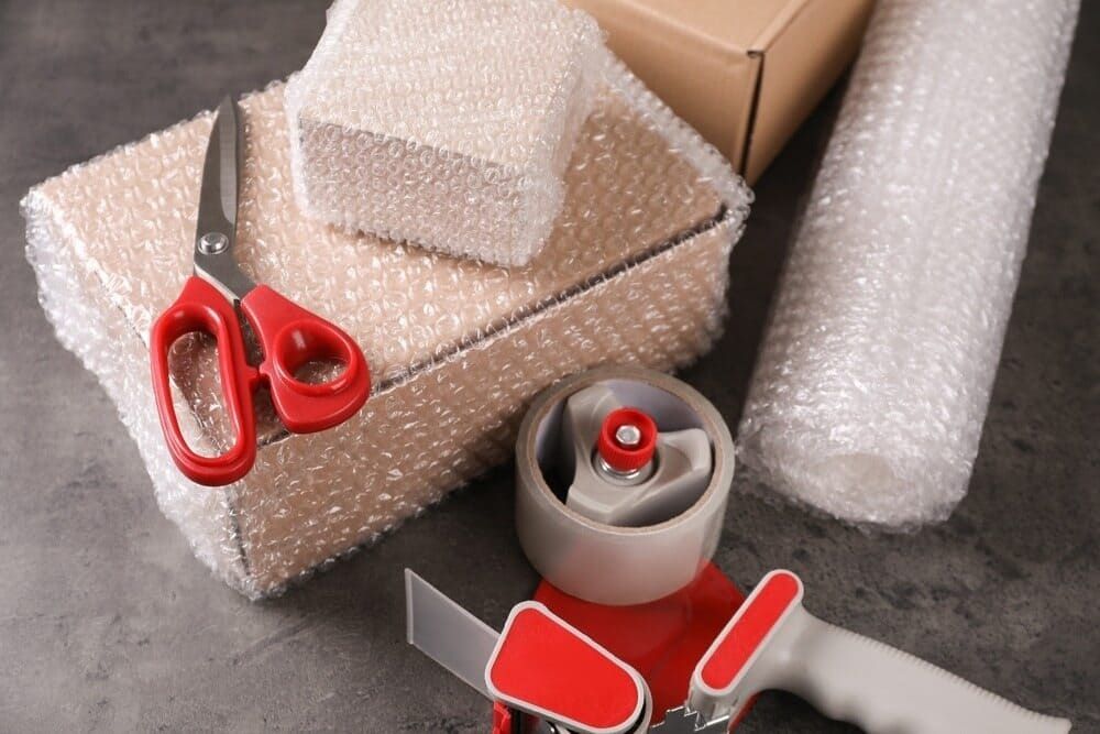 Packing Supplies on a Grey Surface — Cairns Mini Movers In Mount Sheridan, QLD