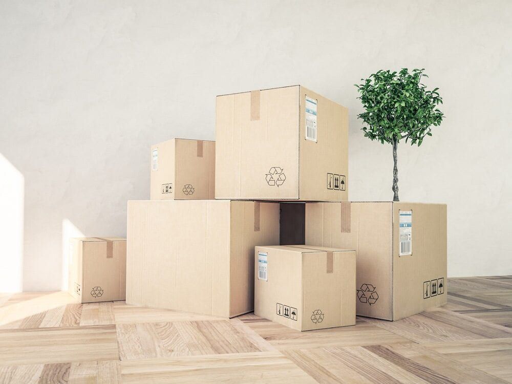 Stack of Cardboard Boxes With Recycling Symbols — Cairns Mini Movers In Mount Sheridan, QLD
