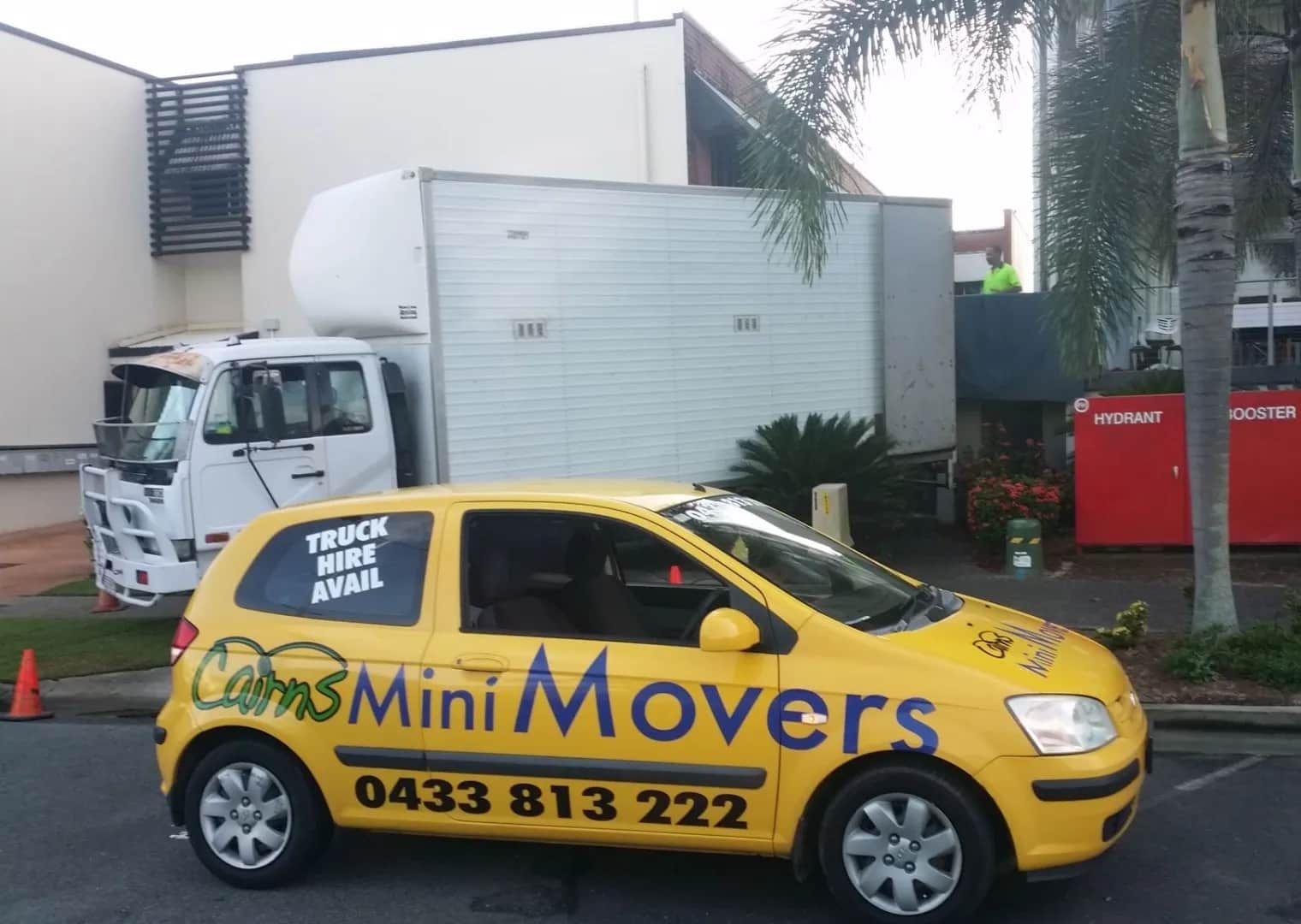 A Yellow Car is Parked on a Street — Cairns Mini Movers In Mount Sheridan, QLD