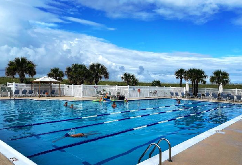 large commercial inground swimming pool designed and installed by Carolina Pool Plastering in Pineville, NC