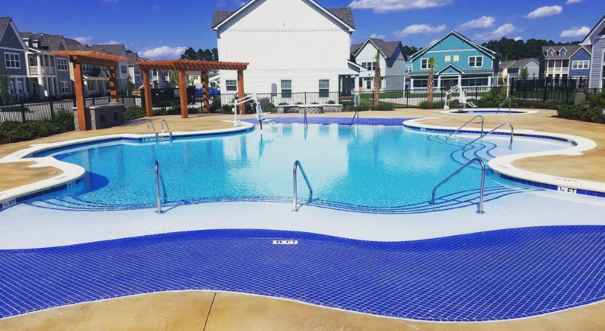 large commercial inground swimming pool designed and installed by Carolina Pool Plastering in Pineville, NC