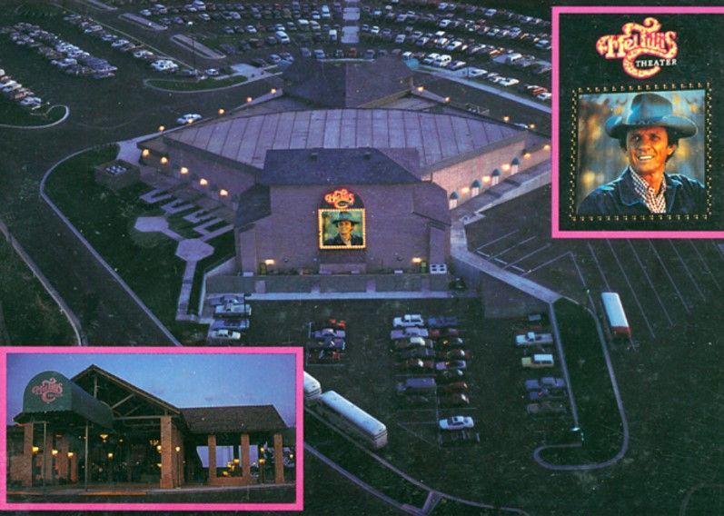 Aerial view of a concert venue with a poster of Michael Jackson. A restaurant is in the lower left corner.