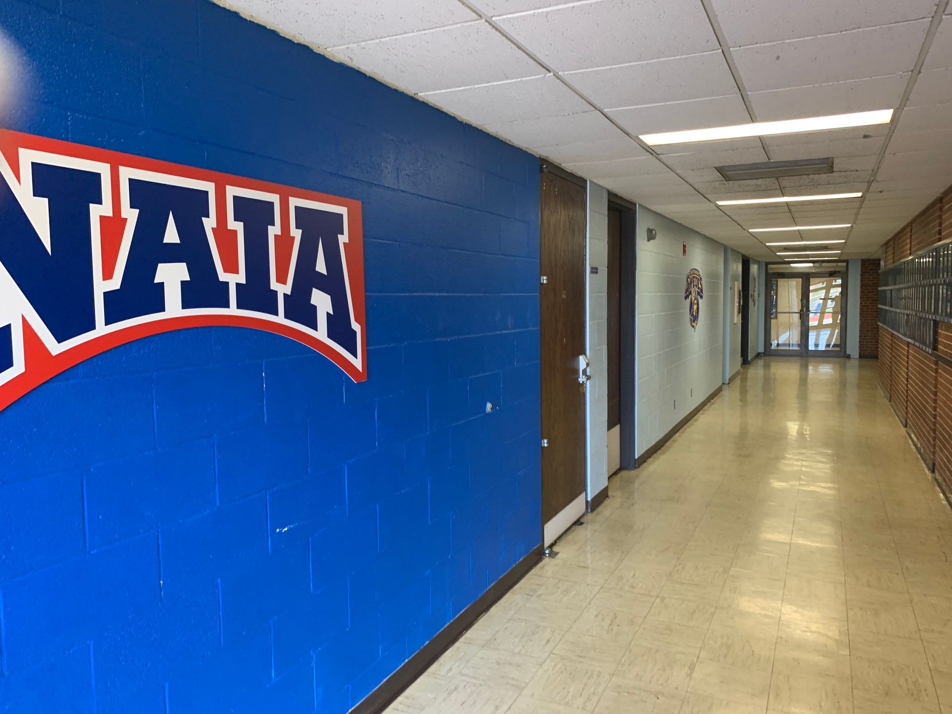 Blue hallway with a large