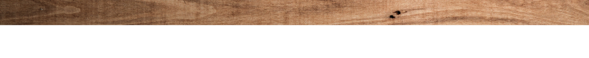 Wooden plank surface with a white strip along the top edge