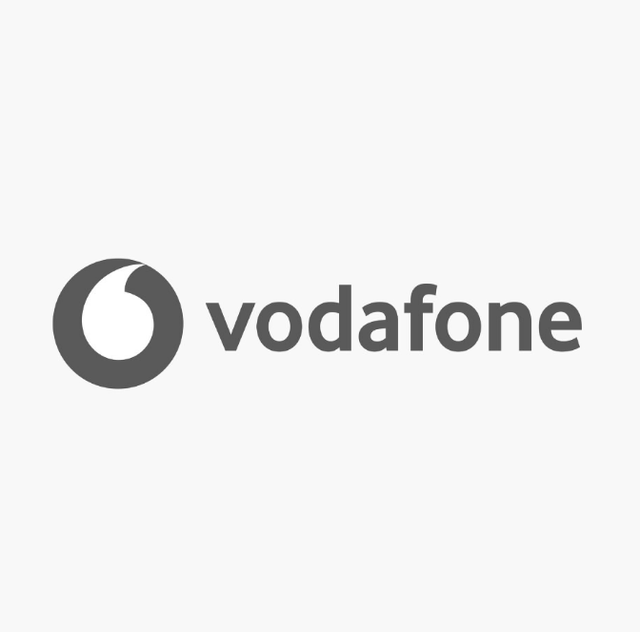 Vodafone logo: a dark gray circle with a curved line, beside the word "vodafone".