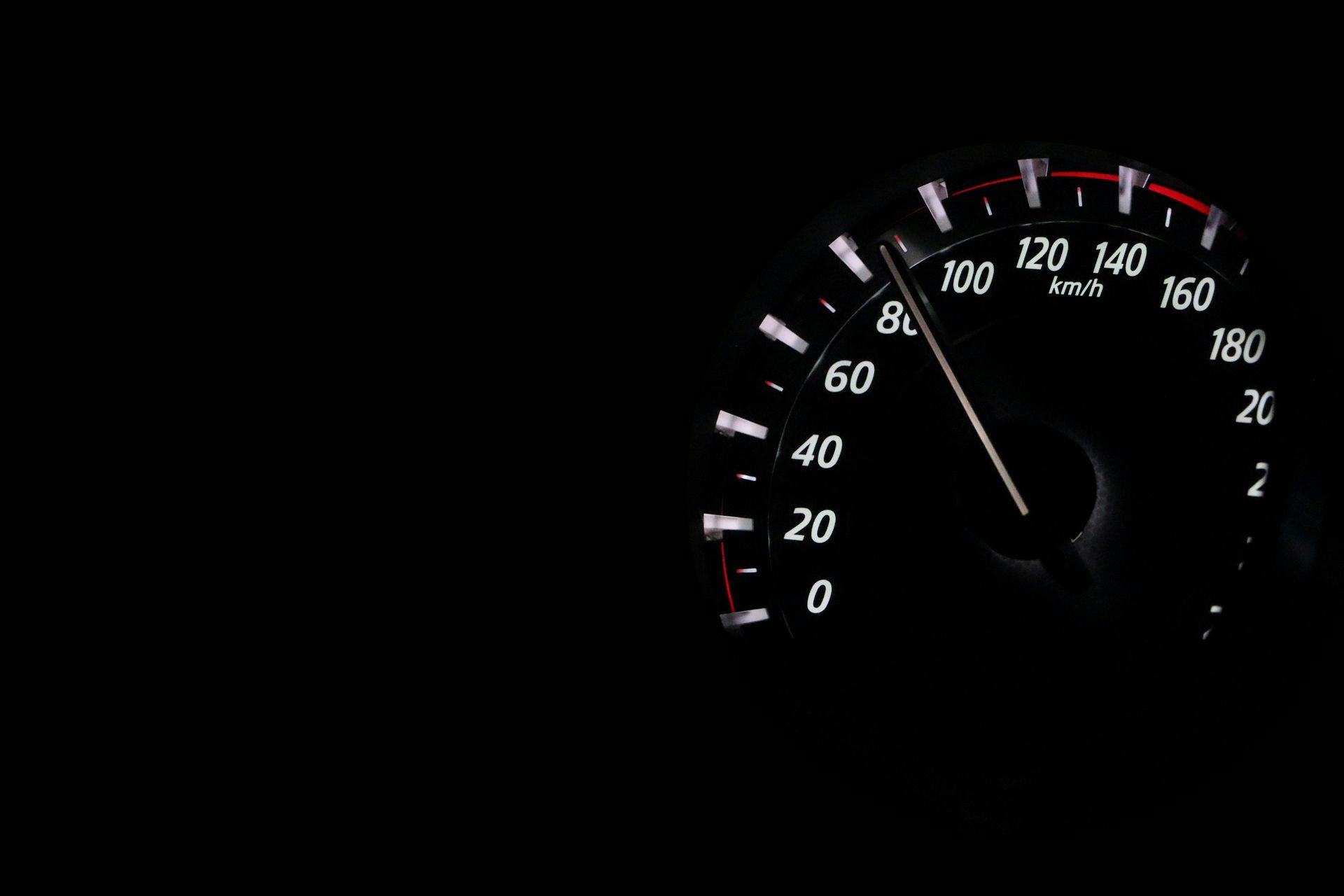Speedometer displaying 90 km/h against a black background.