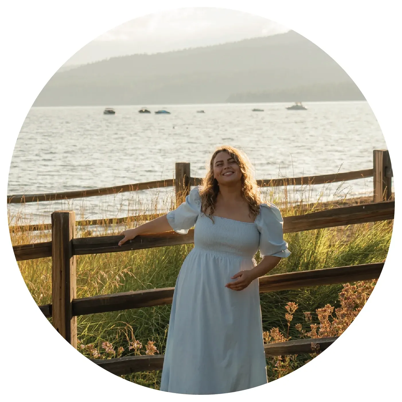 A woman in a green tank top is standing in a circle.