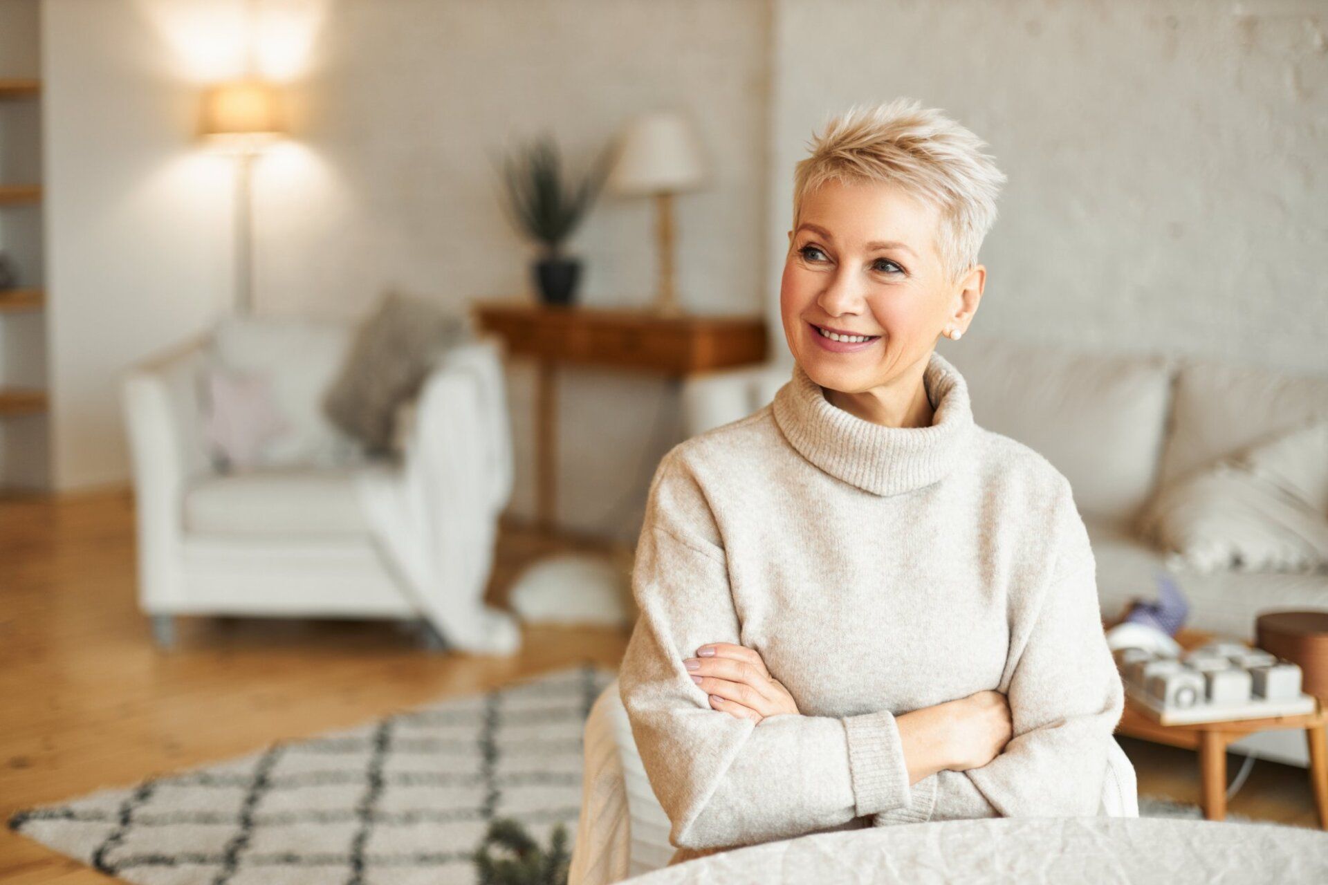 smiling senior woman relaxes at home