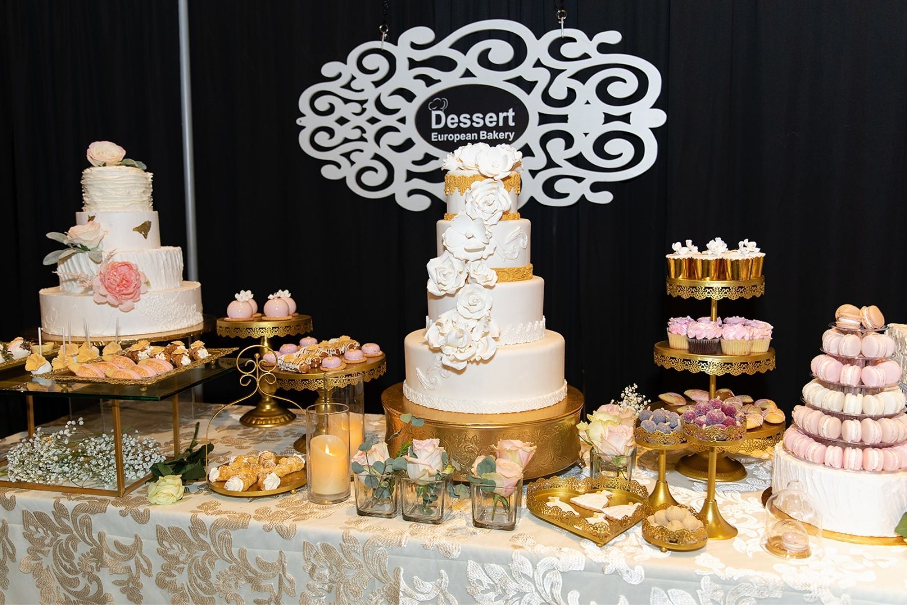 There are many different types of desserts on the table.