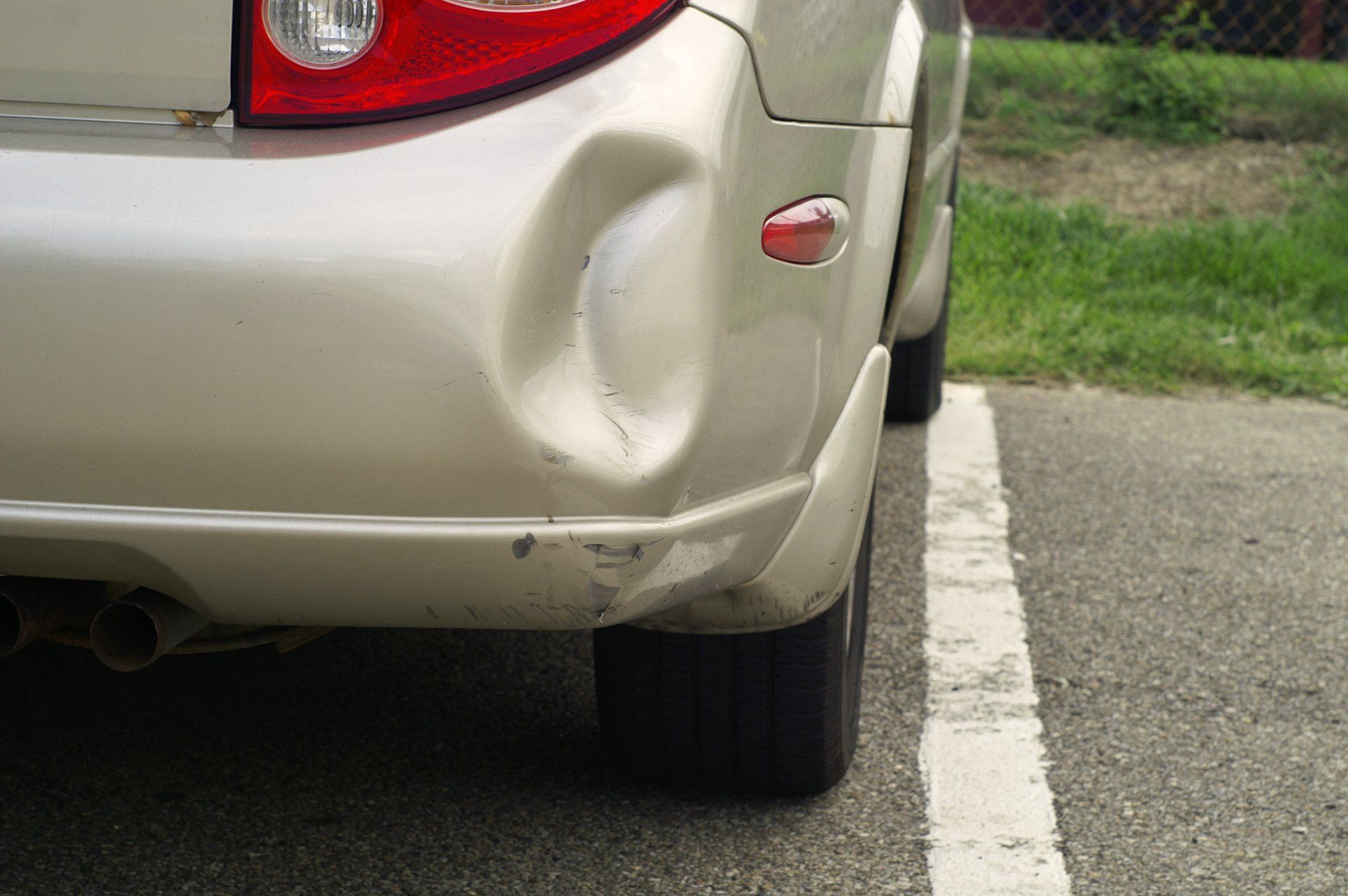 Dented Car Bumper - Sidney, NE - Pittam Body Shop Inc.